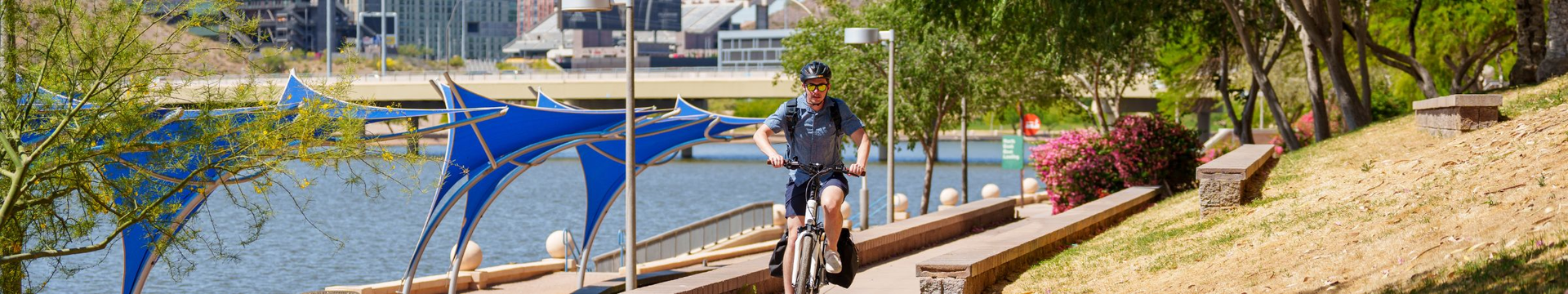 ebike rider next to the water